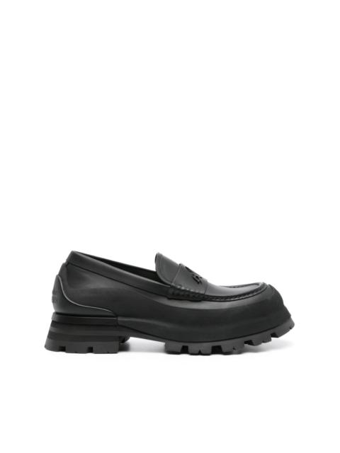 Seal-logo leather loafers