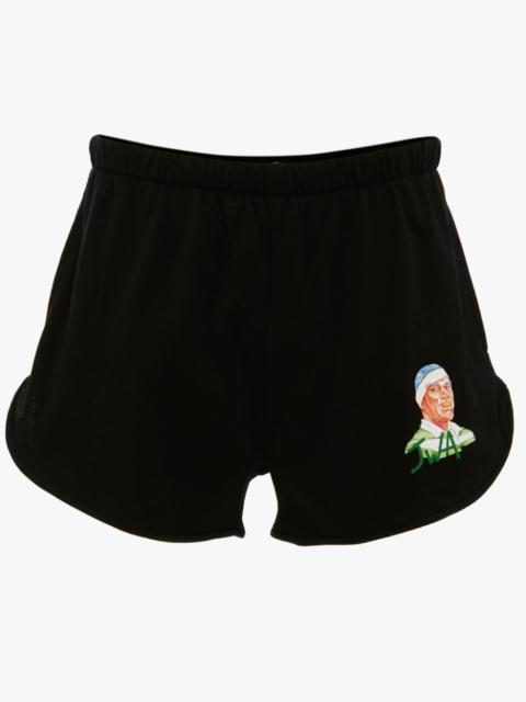 JW Anderson EMBROIDERED RUGBY FACE RUNNING SHORTS