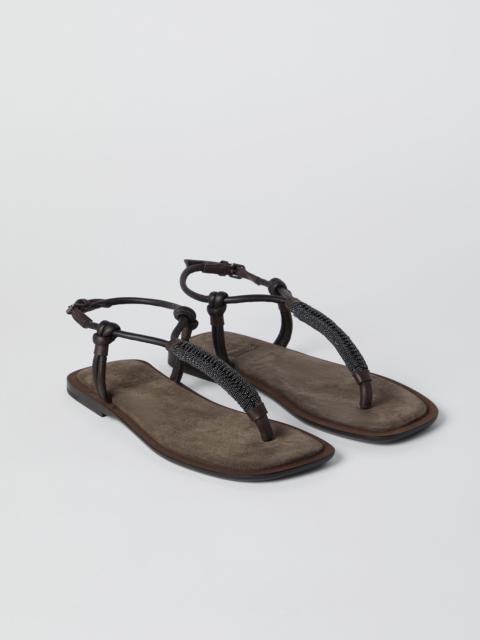 Suede sandals with precious braided straps