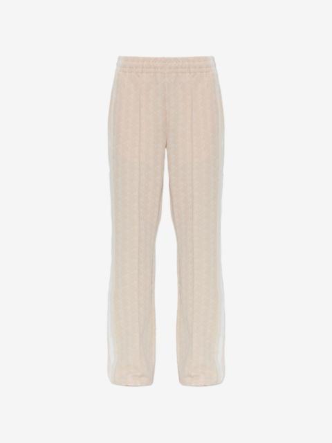 LACOSTE monogram-pattern flared track pants