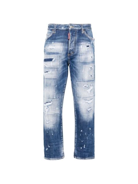 mid-rise tapered-leg jeans