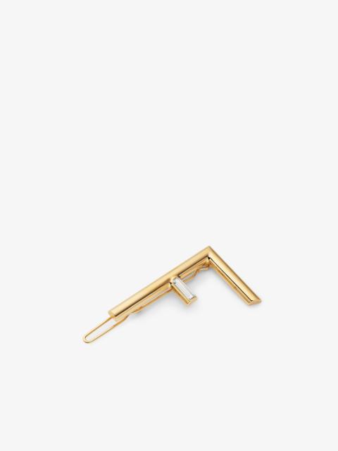 FENDI Hair clip with Fendi First logo. Made of gold-finish metal. Decorated with Baguette-cut white crysta