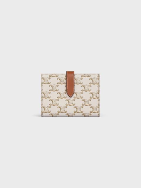 CELINE Medium strap wallet in Triomphe Canvas and Lambskin