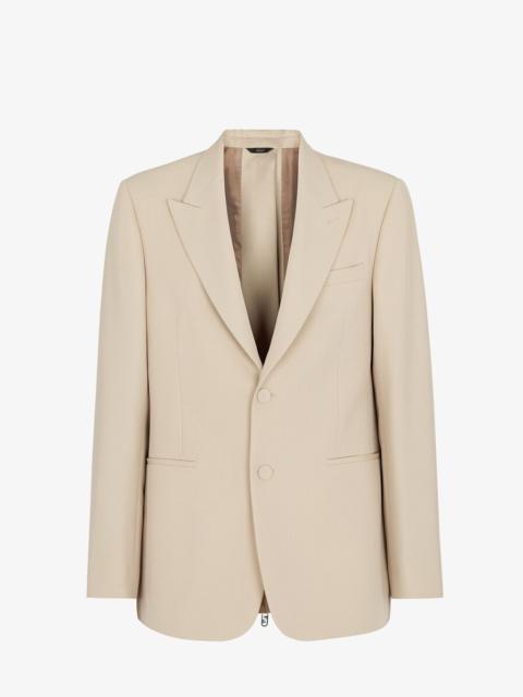 FENDI Straight-cut single-breasted jacket. Peak lapels, breast pocket and welt pockets. Closure with cover