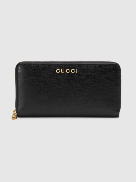 GUCCI Zip around wallet with Gucci script