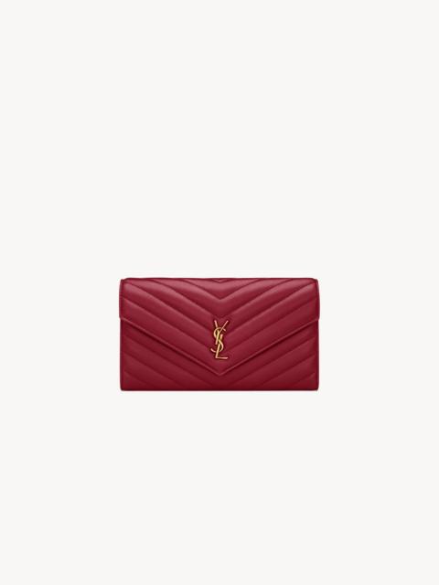 SAINT LAURENT CASSANDRE LARGE FLAP WALLET IN LAMBSKIN