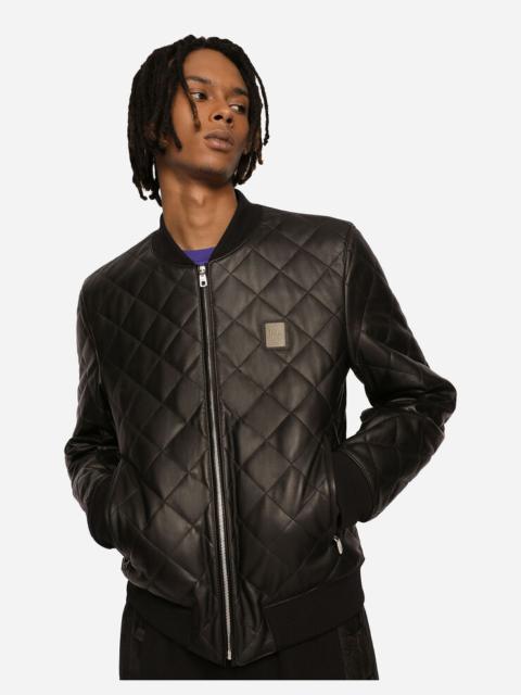 Quilted leather jacket with branded plate