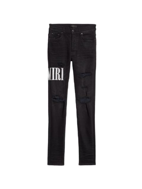 AMIRI logo distressed jeans