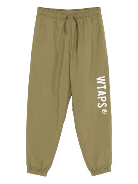 WTAPS logo-print track pants