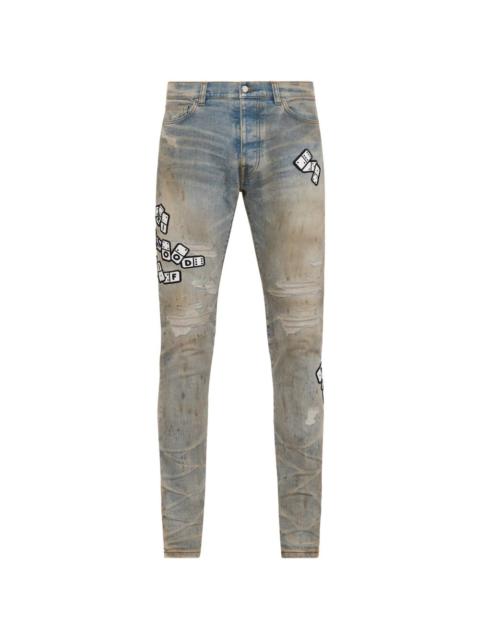 AMIRI applique skinny jeans