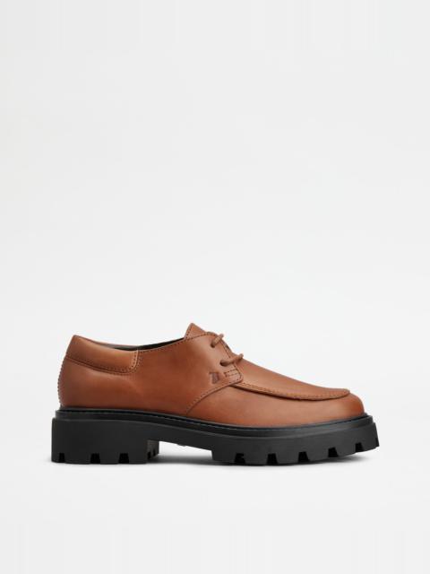 Tod's LUGGED LACE-UPS IN LEATHER - BROWN