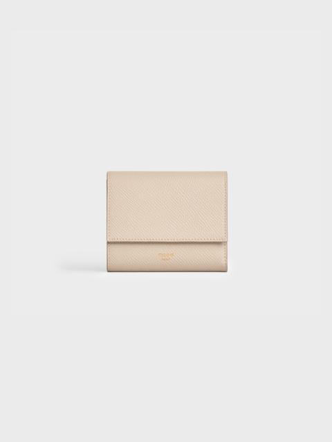 COMPACT ZIPPED WALLET CUIR TRIOMPHE IN TEXTILE AND CALFSKIN