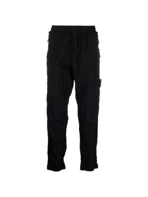 Compass-motif track pants