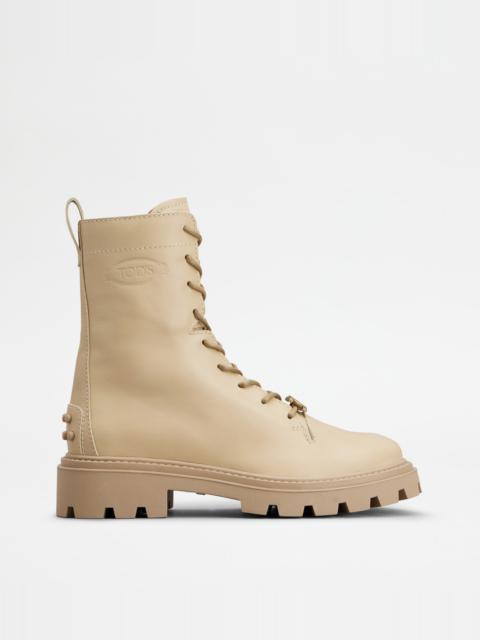 Tod's COMBAT BOOTS IN LEATHER - BEIGE