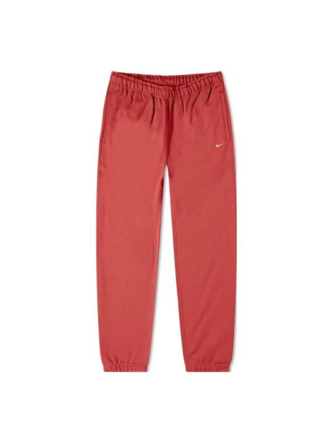 Nike Men's Nike Solid Color Fleece Lined Bundle Feet Casual Sports Pants/Trousers/Joggers Red CW5460-661