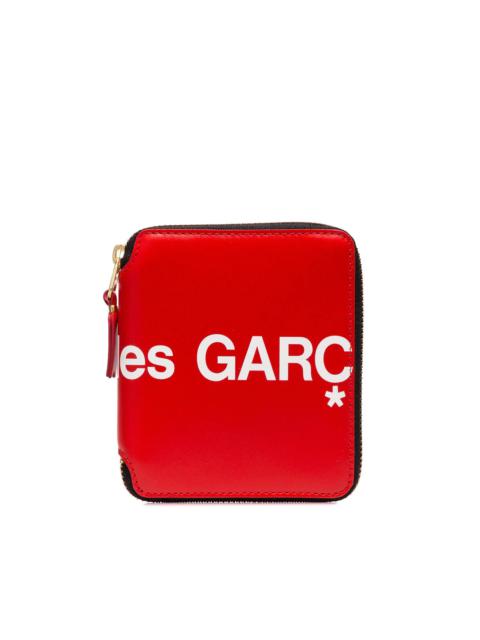 Comme Des Garçons logo print zipped wallet