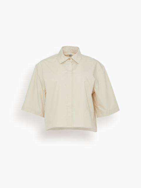 Totême Cropped Cotton-Poplin Shirt in Stone