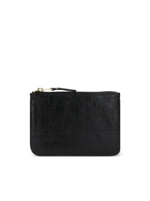 Comme Des Garçons embossed zip purse