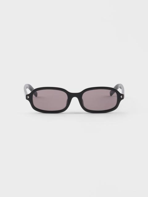 Prada Sunglasses with the iconic metal plaque