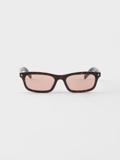 Prada Sunglasses with the iconic metal plaque