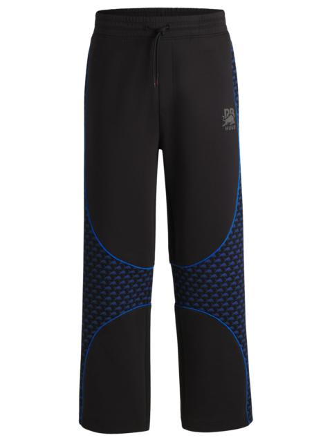 HUGO HUGO X RB TRACKSUIT BOTTOMS WITH PIPING DETAILS