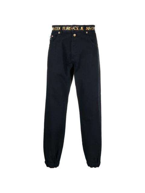 VERSACE JEANS COUTURE logo waistband trousers