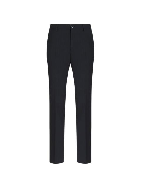 pressed-crease tailored trousers