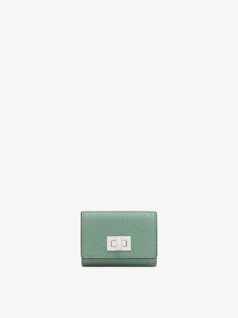 FENDI Compact, tri-fold Peekaboo wallet with large internal bill compartment and three concealed card hold