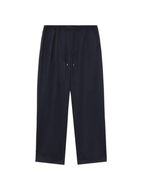 A KIND OF GUISE elasticated straight-leg trousers