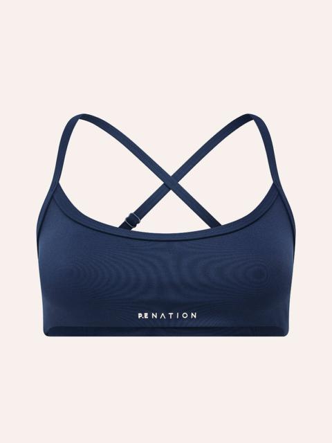 P.E NATION REVEAL SPORTS BRA IN DARK NAVY