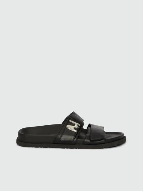 Flat sandals in black leather and "TheMwave" logo