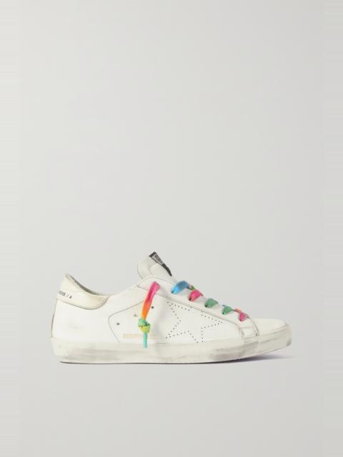 Superstar faux pearl-embellished distressed leather sneakers