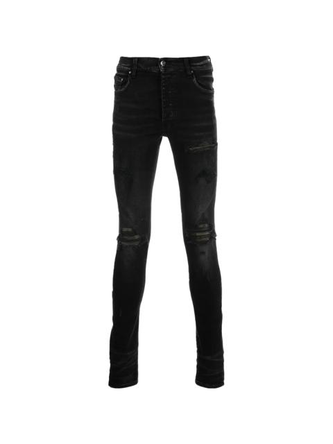 AMIRI MX1 Camo Leather Patch Jeans "Aged Black" PF22MDS028 023