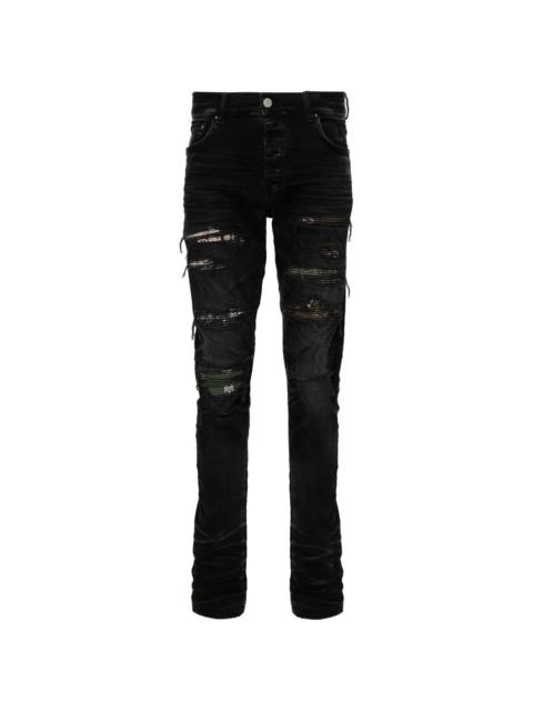 Trasher ripped skinny jeans