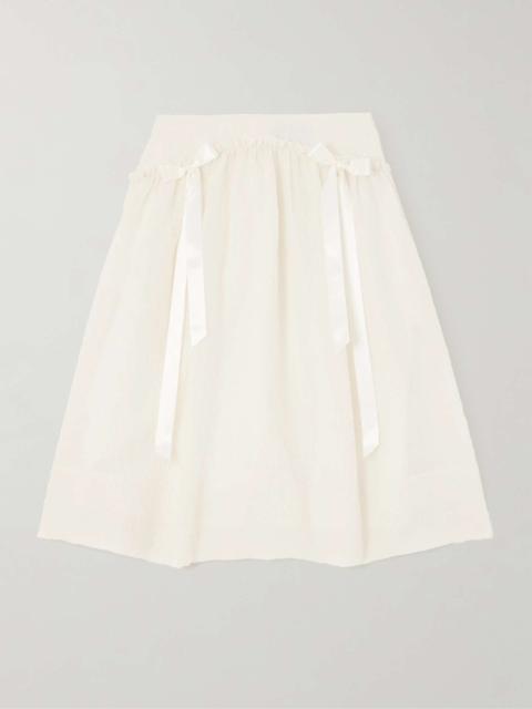 Bow-embellished ruffled cloqué midi skirt