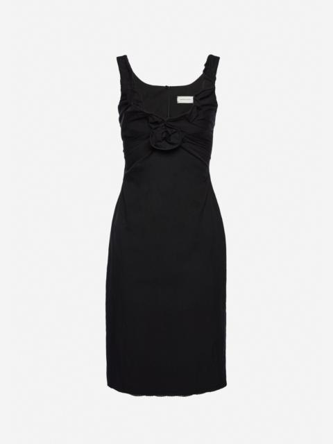 Sleeveless dress with draped neckline in black