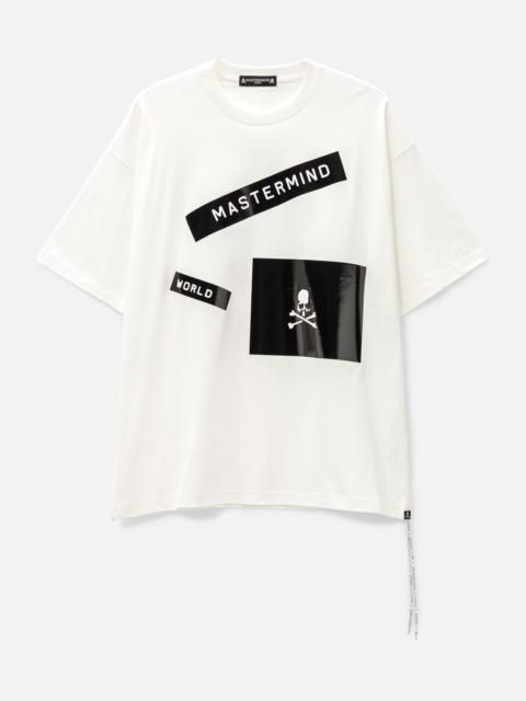 MASTERMIND WORLD OVERSIZED LABEL T-SHIRT