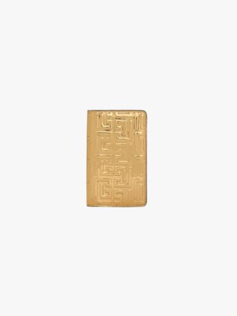 Balmain Golden debossed high-shine leather passport holder with Balmain monogram