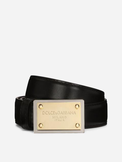 Calfskin belt with branded tag
