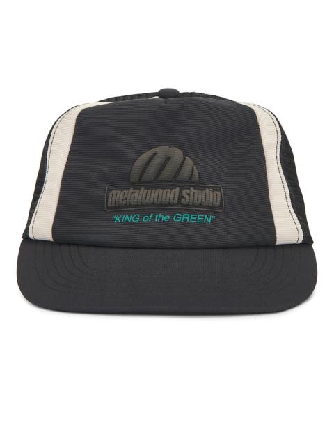Metalwood Studio King Of The Greens Trucker Hat
