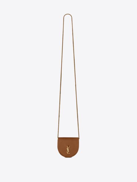 Manhattan mini crossbody bag in aged vegetable-tanned leather, Saint  Laurent