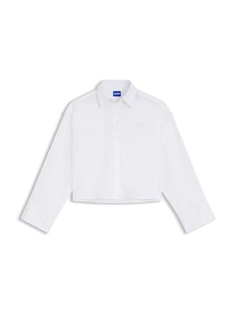 HUGO OVERSIZED PINSTRIPED COTTON SHIRT WITH OPEN-CUT HEM
