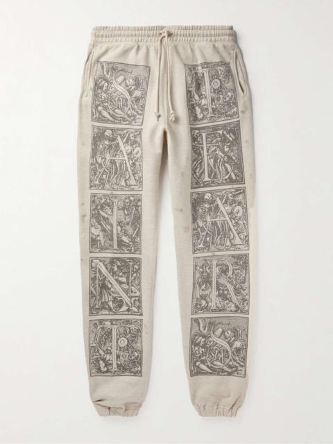 + Denim Tears Tapered Printed Distressed Cotton-Jersey Sweatpants