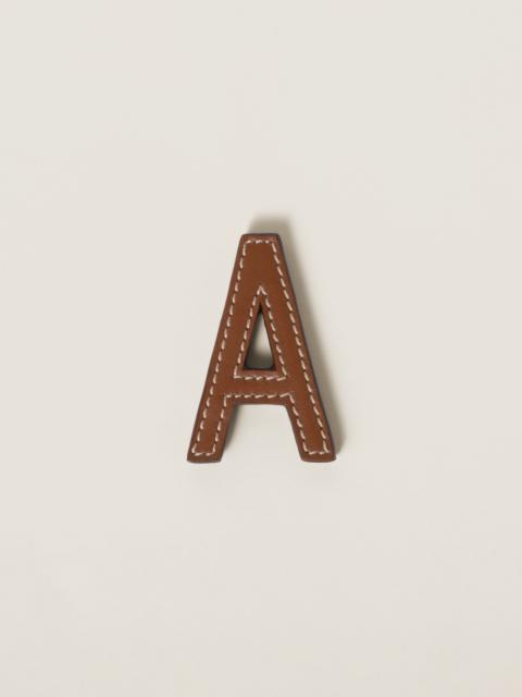 Miu Miu Leather and metal brooch