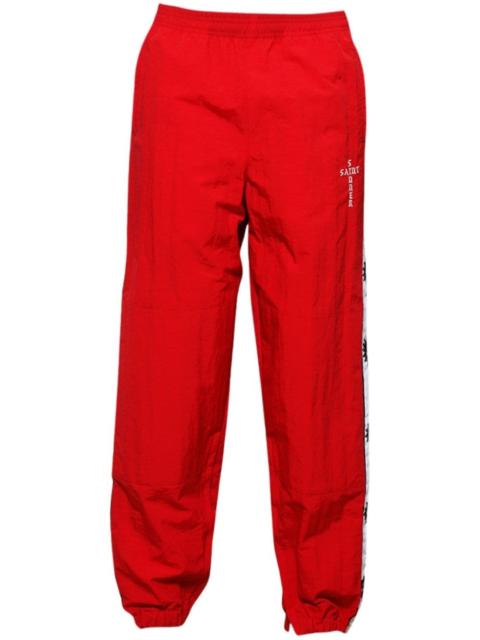 SAINT M×××××× logo-tape track pants