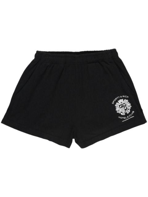 Sporty & Rich Hotel Disco logo-embroidered shorts