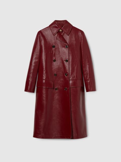 Shiny leather double-breasted coat