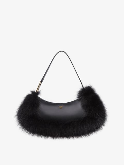 FENDI Pouch made of black leather, embellished with tone on tone fox fur and decorated with Fendi Roma let