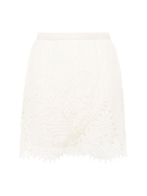 Viny lace mini skirt