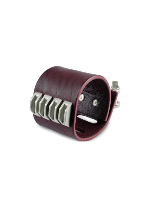 Parts of Four Restraint Charm inverted-pyramid studs bracelet